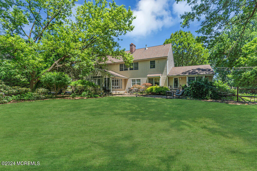5 Clover Lane Rumson, NJ 07760 - Photo 12 of 12 a front view of a house with a yard