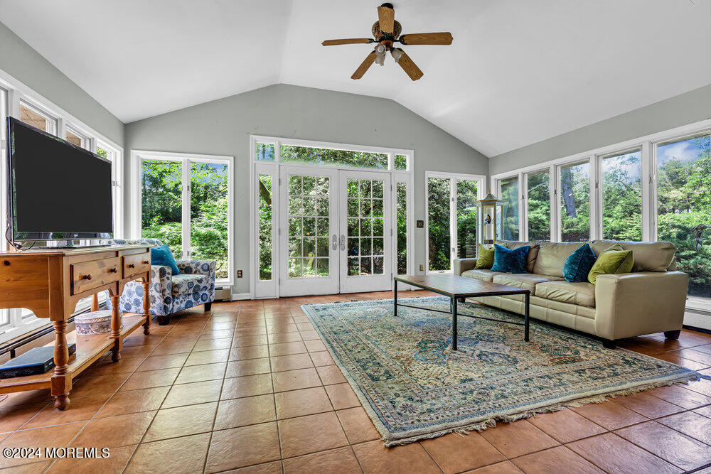 5 Clover Lane Rumson, NJ 07760 - Photo 6 of 12 a living room with furniture and a flat screen tv