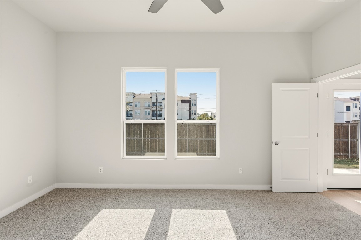 2206 Luna Azul View, Unit 78 Round Rock, TX 78664 - Photo 13 of 31 Unfurnished room featuring light colored carpet and ceiling fan