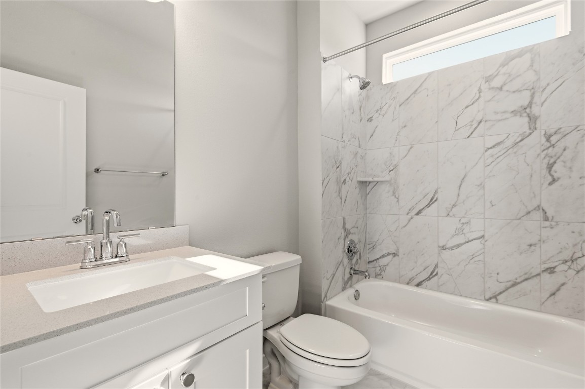 2206 Luna Azul View, Unit 78 Round Rock, TX 78664 - Photo 23 of 31 Full bath featuring vanity and tub / shower combination