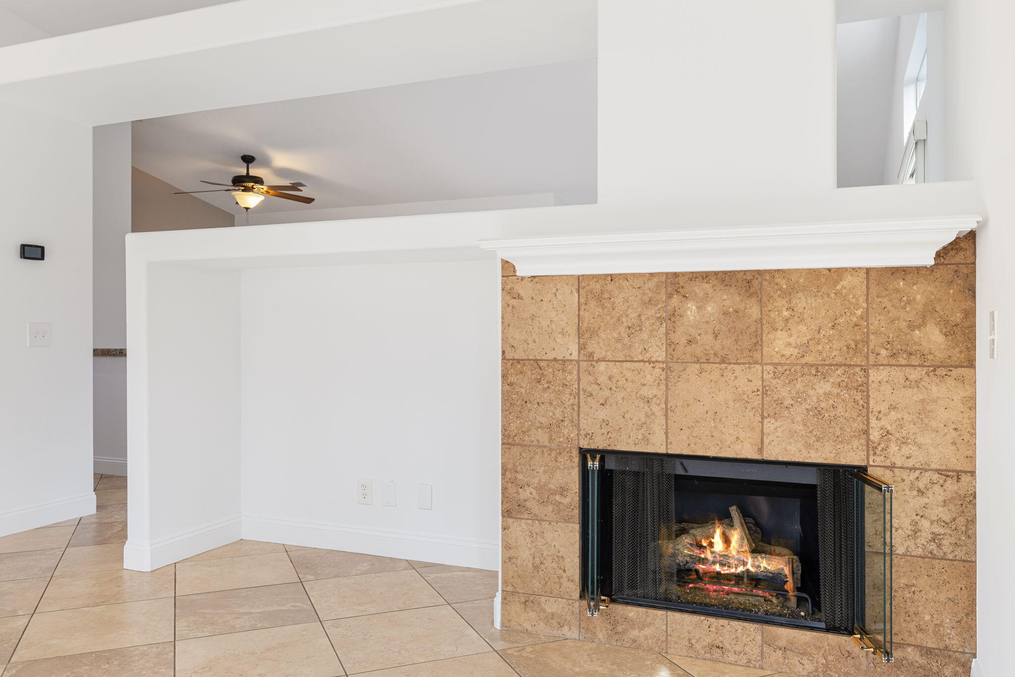 80601 Declaration Avenue Indio, CA 92201 - Photo 21 of 52 a living room with a fireplace
