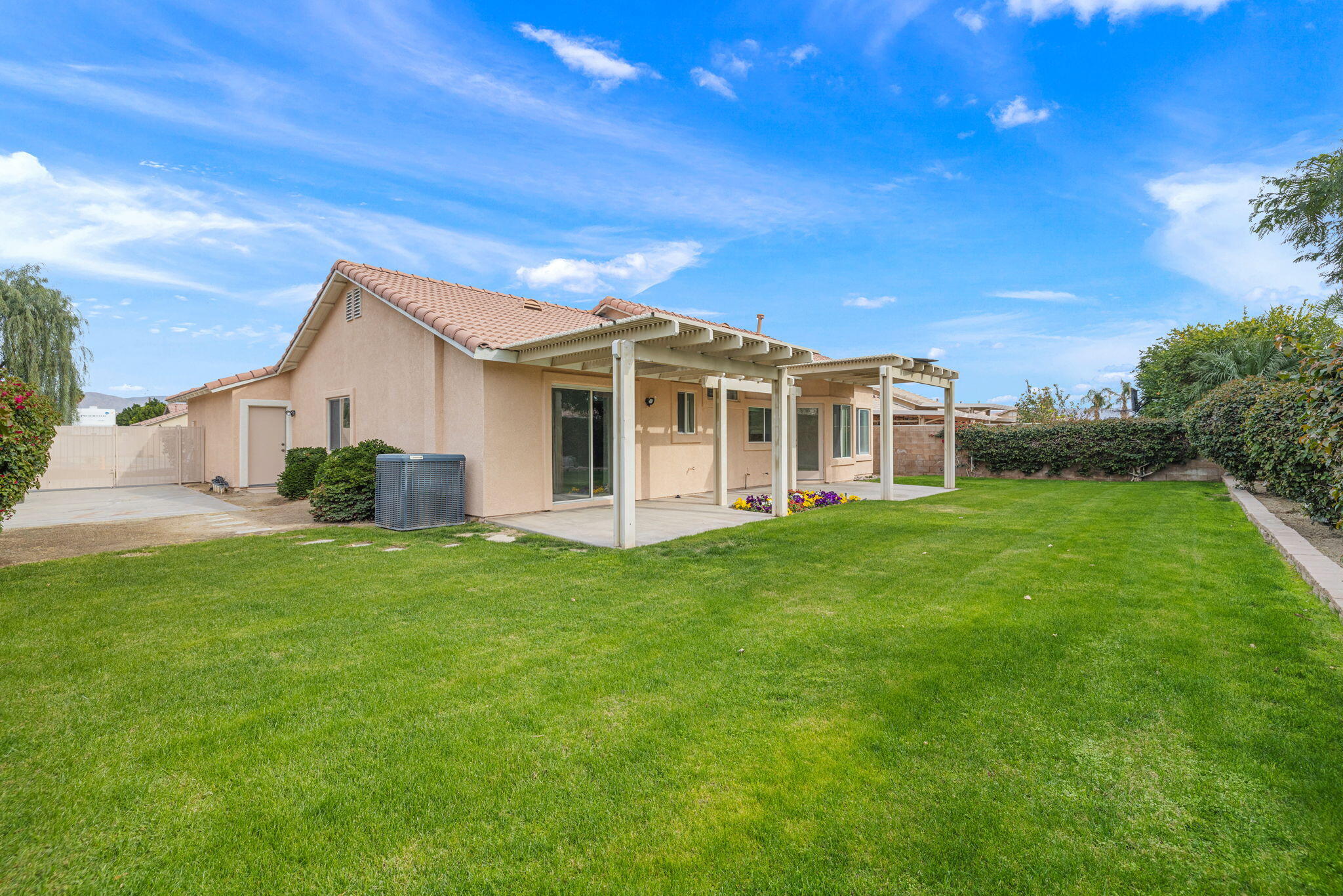 80601 Declaration Avenue Indio, CA 92201 - Photo 44 of 52 a view of a house with a backyard