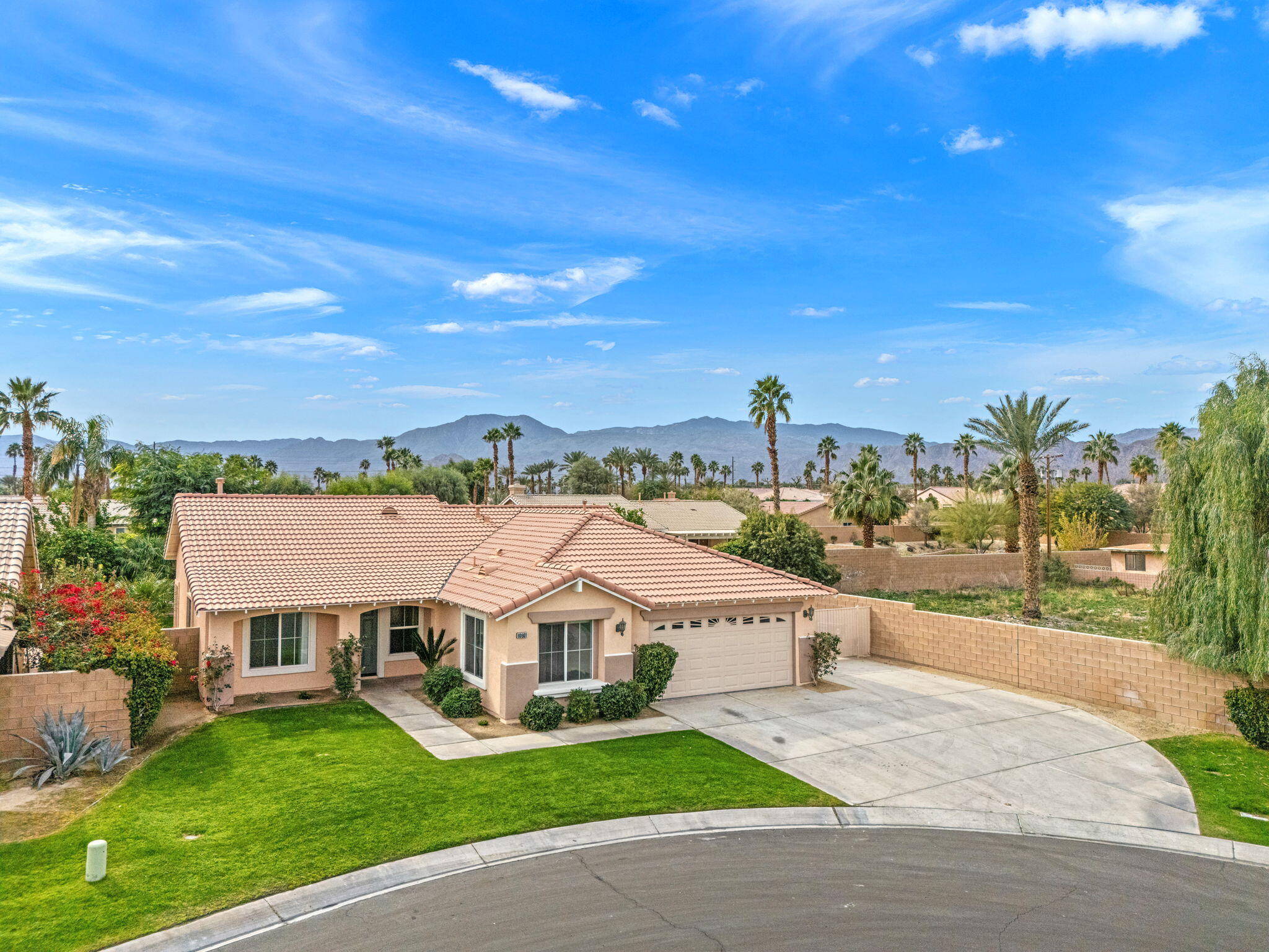 80601 Declaration Avenue Indio, CA 92201 - Photo 51 of 52 a aerial view of a house with a garden and plants