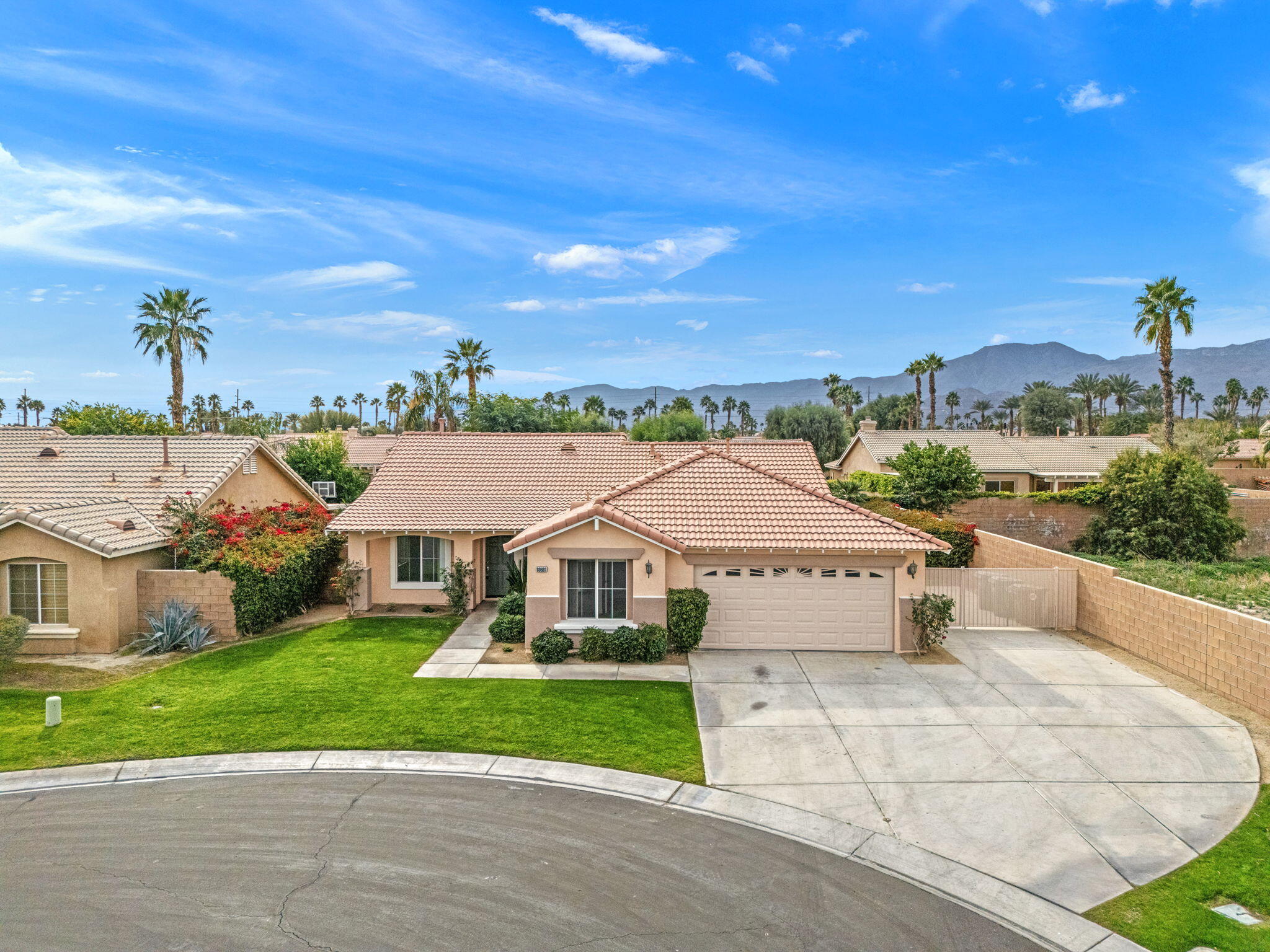 80601 Declaration Avenue Indio, CA 92201 - Photo 8 of 52 a front view of a house with a yard