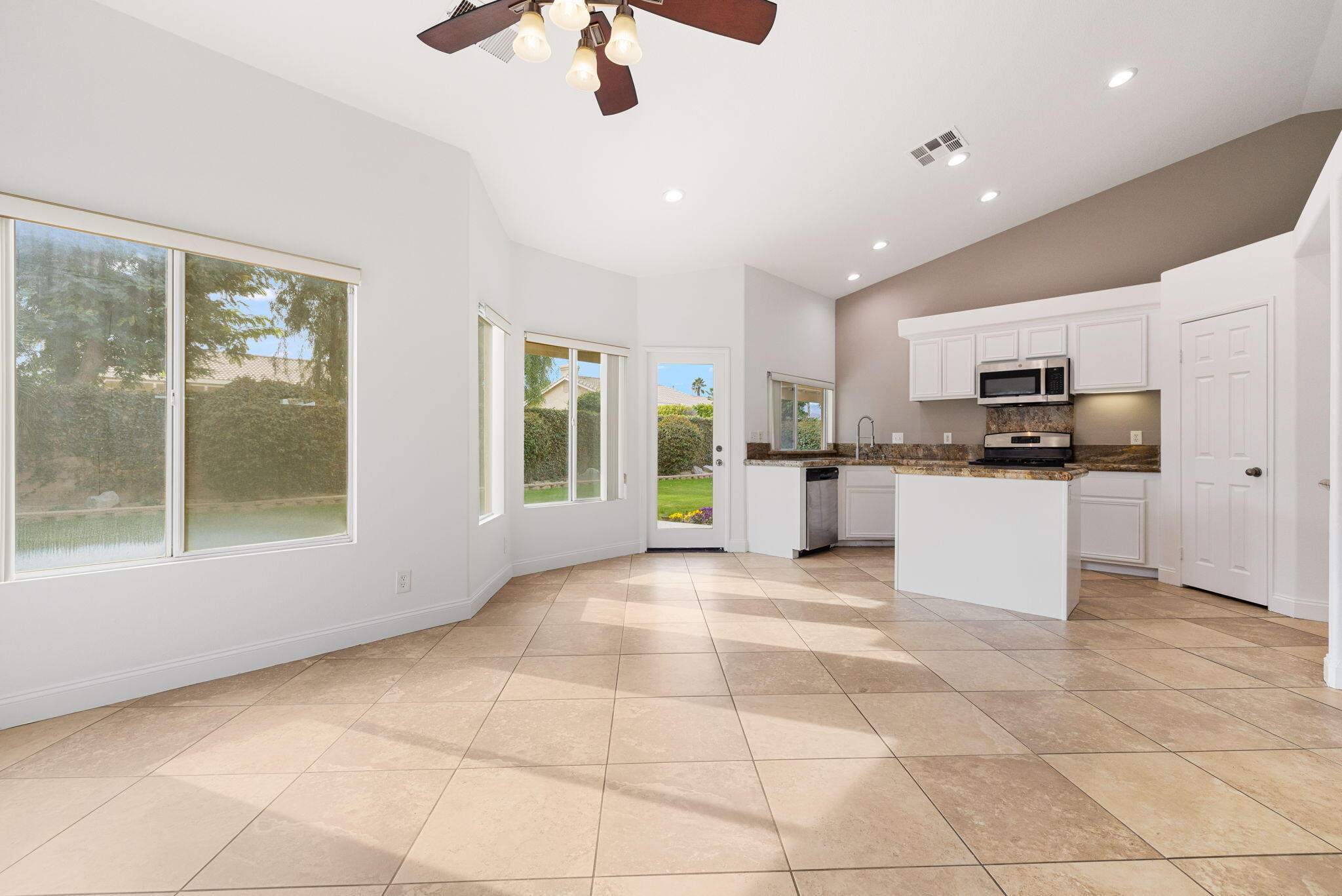 80601 Declaration Avenue Indio, CA 92201 - Photo 10 of 52 a view of a kitchen with microwave and cabinets
