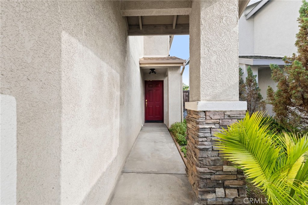 431 West Bay Street, Unit S Costa Mesa, CA 92627 - Photo 2 of 34 a view of entryway with a house