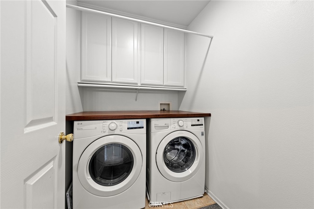 431 West Bay Street, Unit S Costa Mesa, CA 92627 - Photo 26 of 34 a utility room with dryer and washer