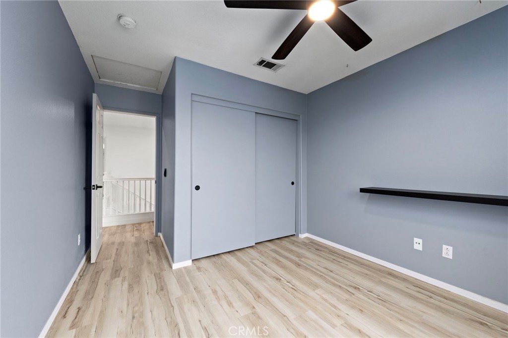 431 West Bay Street, Unit S Costa Mesa, CA 92627 - Photo 28 of 34 a view of empty room with wooden floor
