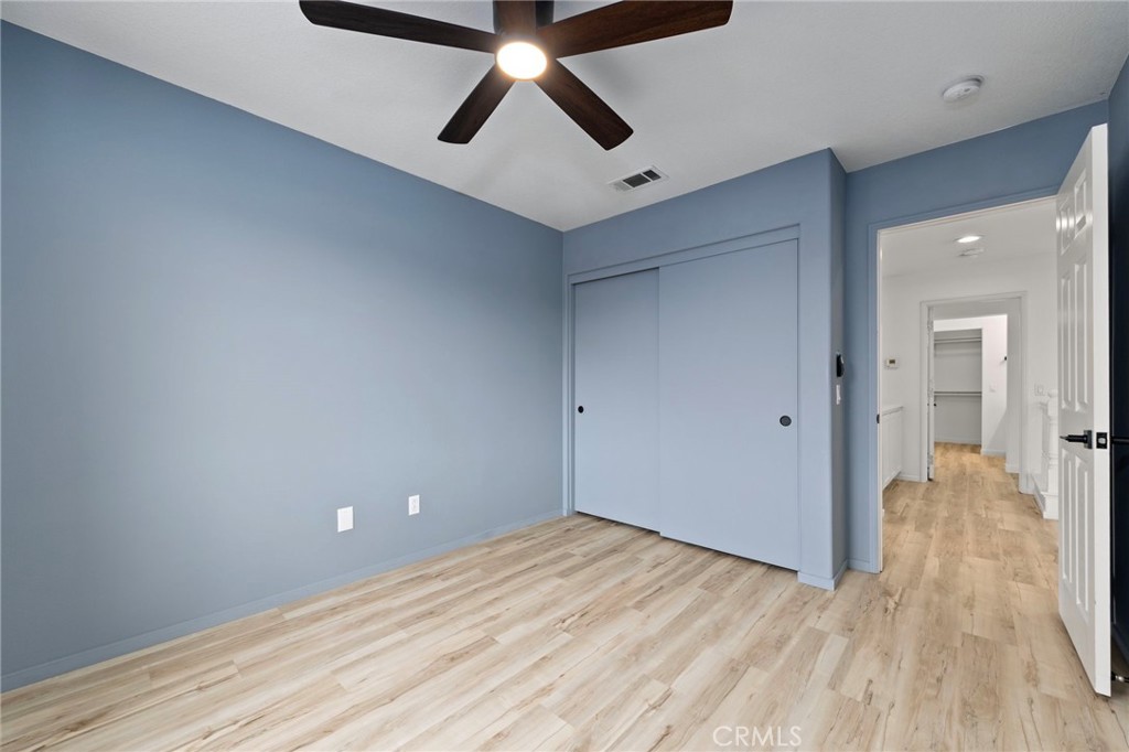431 West Bay Street, Unit S Costa Mesa, CA 92627 - Photo 31 of 34 a view of empty room with wooden floor