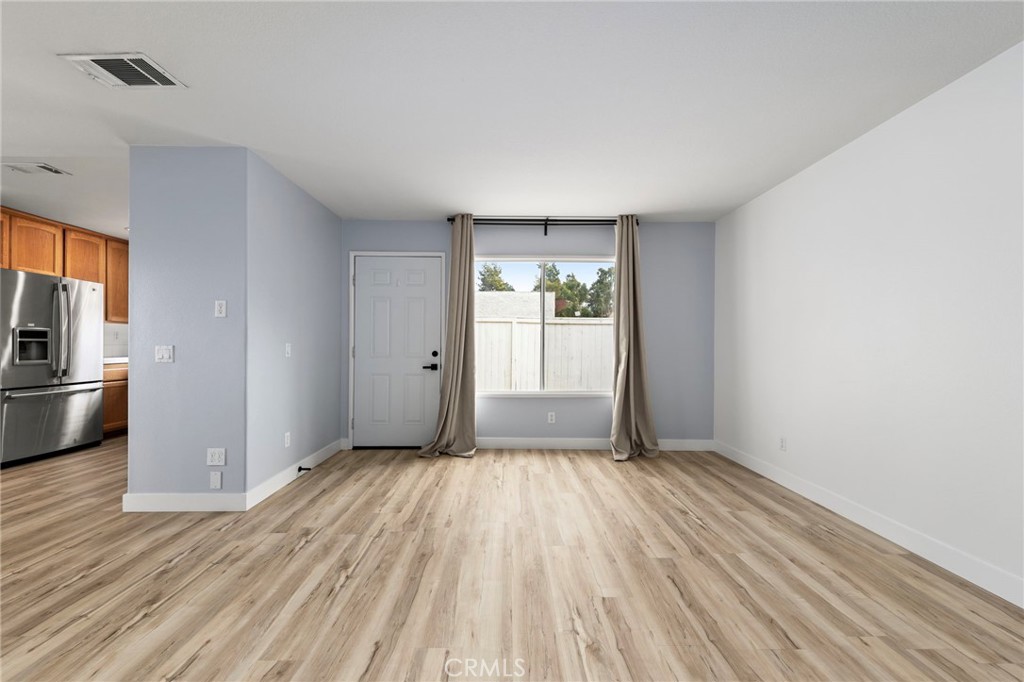431 West Bay Street, Unit S Costa Mesa, CA 92627 - Photo 9 of 34 a view of a livingroom with wooden floor