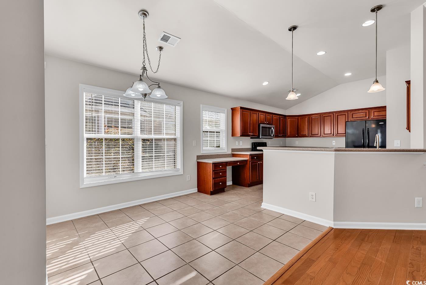 2454 Windmill Way Myrtle Beach, SC 29579 - Photo 11 of 33 Kitchen with light tile patterned floors, visible