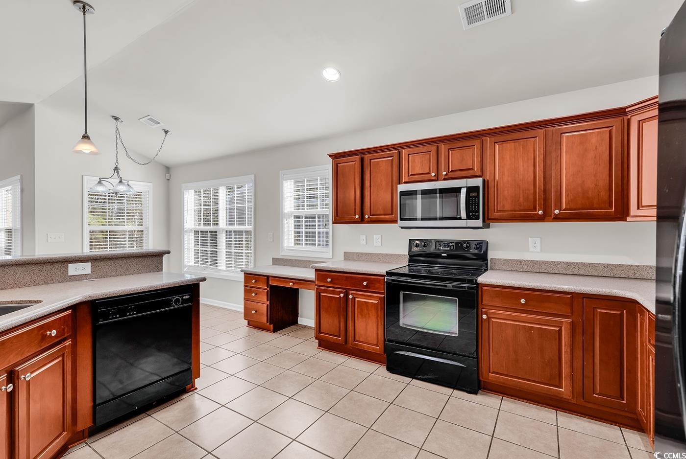 2454 Windmill Way Myrtle Beach, SC 29579 - Photo 10 of 33 Kitchen featuring light tile patterned floors, a p