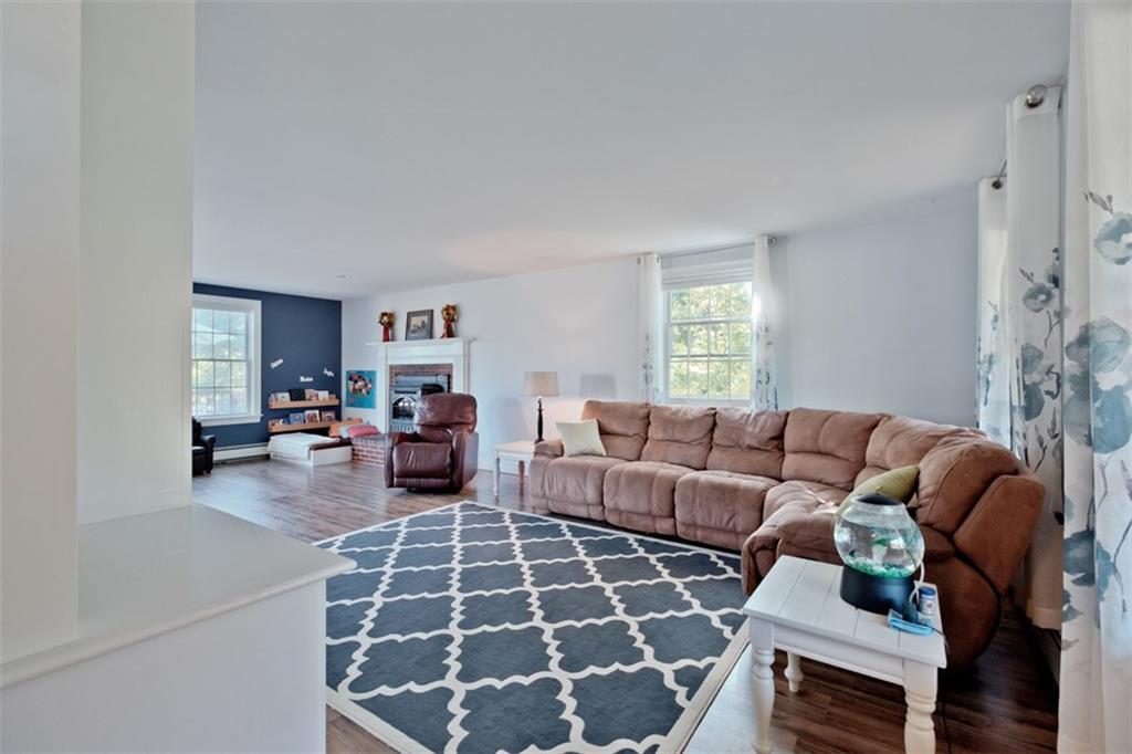 15 Parsonage Road North Yarmouth, ME 04097 - Photo 7 of 33 The front to back living room has...