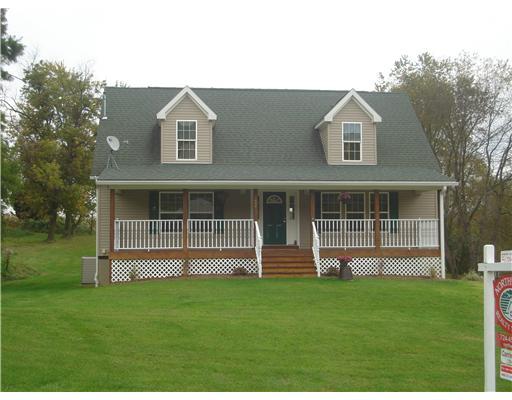 Exterior Front. ADORABLE 4 BEDROOM, 2 FULL BATH ON HALF ACRE. FRESH PAINT. OPEN FLOOR PLAN. FULL UNFINISHED BASEMENT. 2 CAR GARAGE.