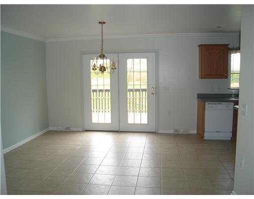 132 Hepler Road Sarver, PA 16055 - Photo 6 of 15 Dining Room. DINING AND KITCHEN AREA, FRENCH DOORS TO LARGE DECK. OPEN FLOOR PLAN. FRESH PAINT AND CERAMIC TILE. OAK CABIINETS.