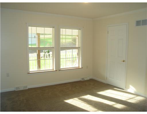 132 Hepler Road Sarver, PA 16055 - Photo 10 of 15 Bedroom. OTHER BEDROOM ON MAIN. HUGE WINDOWS AND A WALK IN CLOSET WITH LIGHT.