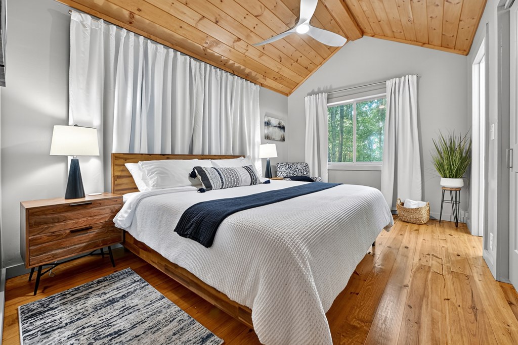 65 Highland Tower Road Blue Ridge, GA 30513 - Photo 20 of 48 a bedroom with a bed and a window