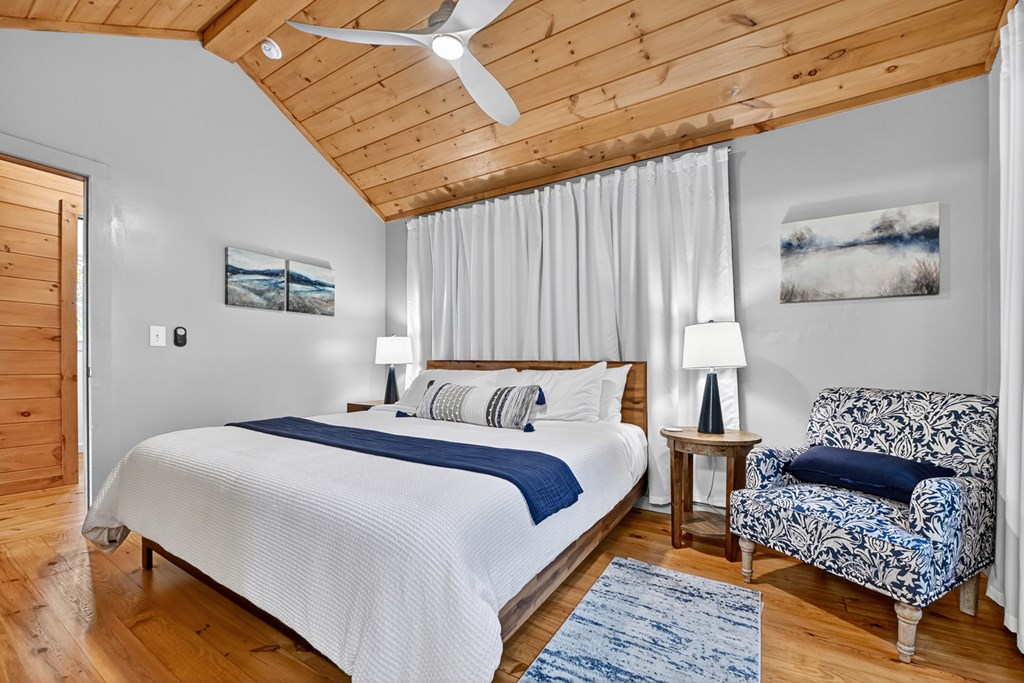 65 Highland Tower Road Blue Ridge, GA 30513 - Photo 21 of 48 a bed room with a bed and a couch