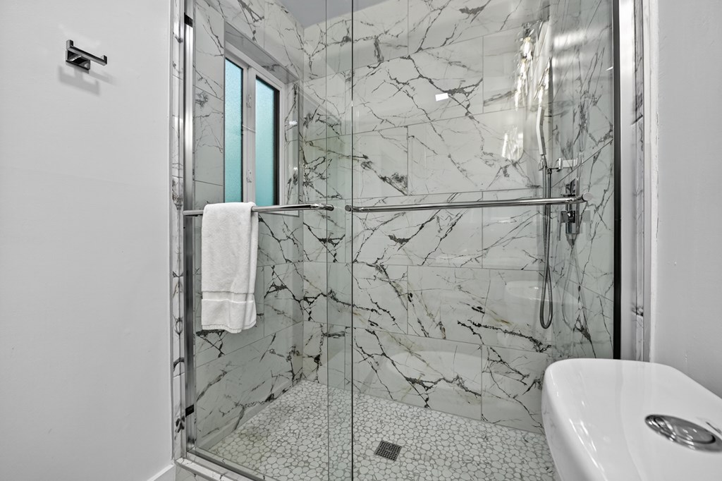 65 Highland Tower Road Blue Ridge, GA 30513 - Photo 23 of 48 a bathroom with a toilet sink and shower