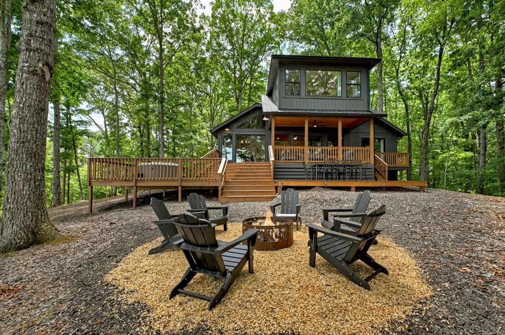 65 Highland Tower Road Blue Ridge, GA 30513 - Photo 44 of 48 a view of a chairs in a backyard