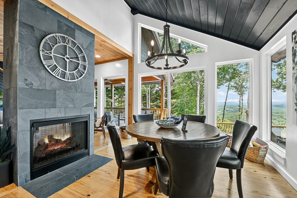 65 Highland Tower Road Blue Ridge, GA 30513 - Photo 8 of 48 a view of a dining room with furniture window and outside view