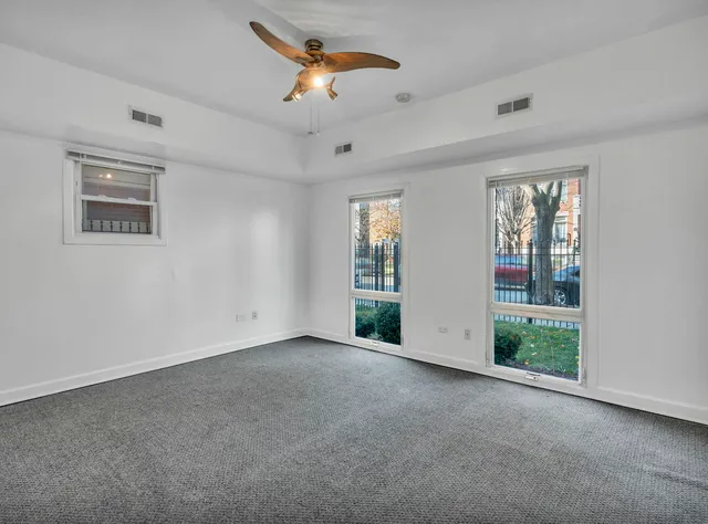 an empty room with windows