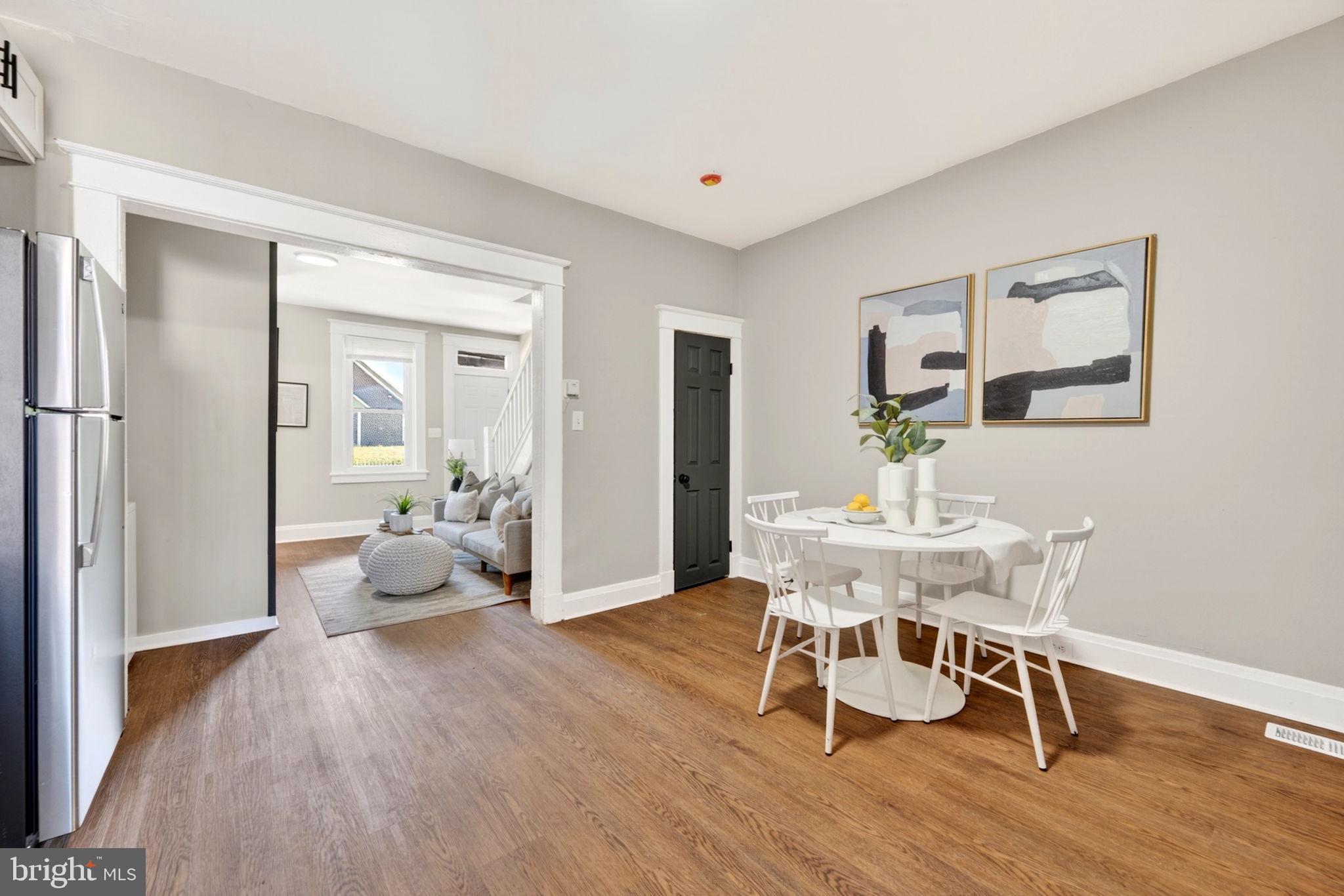 1358 Homestead Street Baltimore, MD 21218 - Photo 15 of 35 a living room with furniture and wooden floor