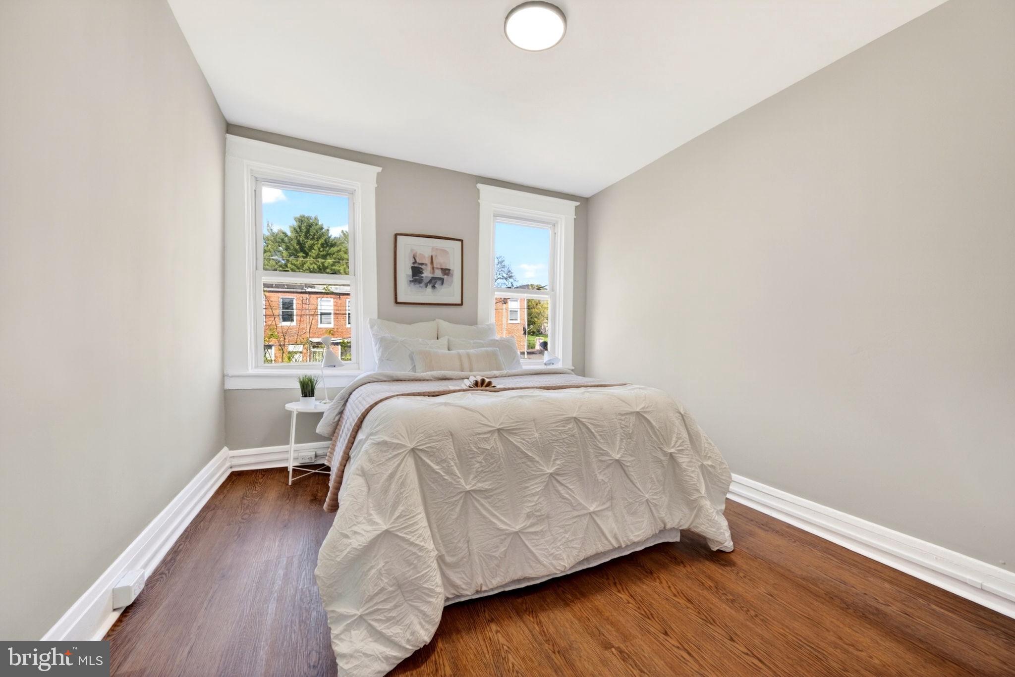 1358 Homestead Street Baltimore, MD 21218 - Photo 26 of 35 a bedroom with a bed and window