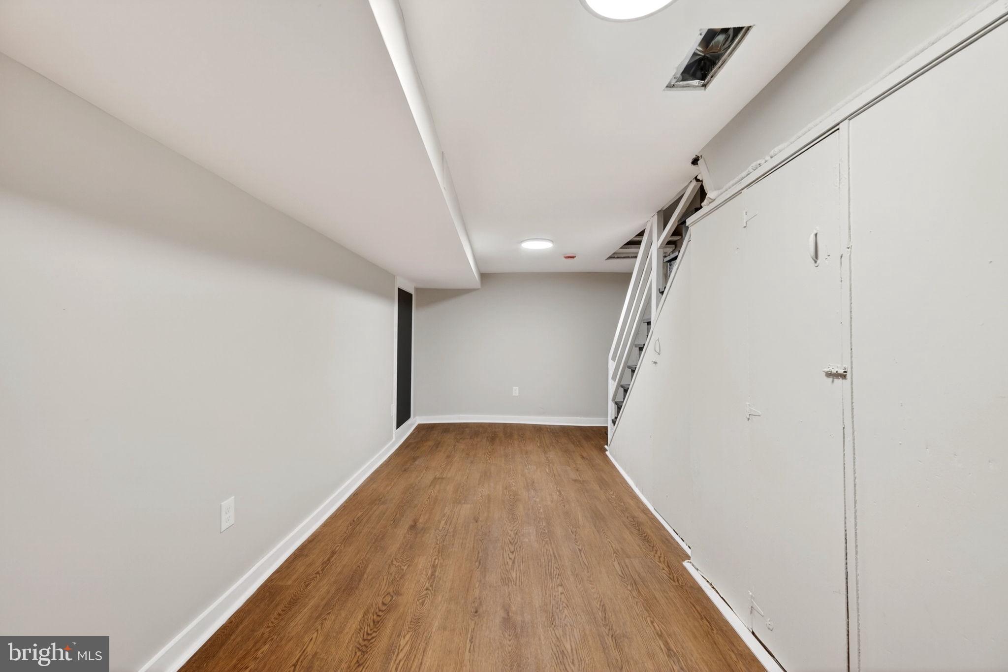 1358 Homestead Street Baltimore, MD 21218 - Photo 31 of 35 a view of hallway with stairs