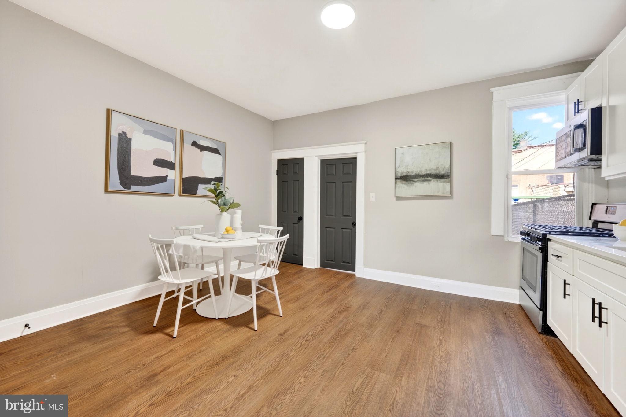 1358 Homestead Street Baltimore, MD 21218 - Photo 9 of 35 a view of a dining room with furniture and wooden floor