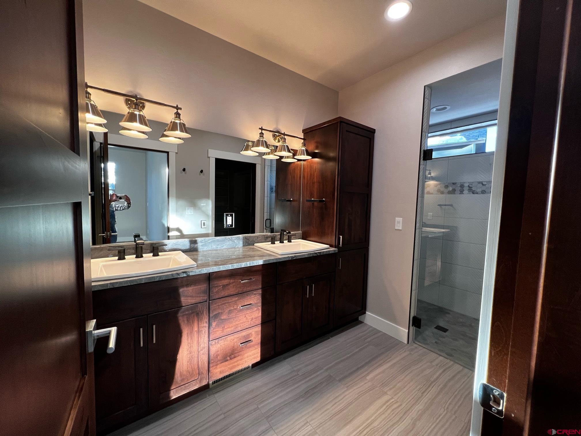 250 Edgemont Meadows Road Durango, CO 81301 - Photo 5 of 10 a kitchen with a sink and refrigerator