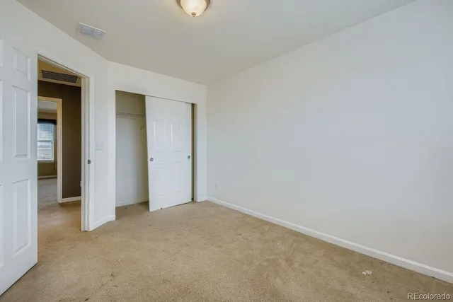 an empty room with closet