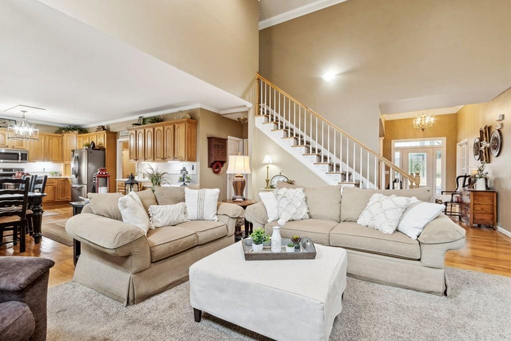 4385 Signal Ridge Court Buford, GA 30518 - Photo 13 of 81 a living room with furniture and a large window