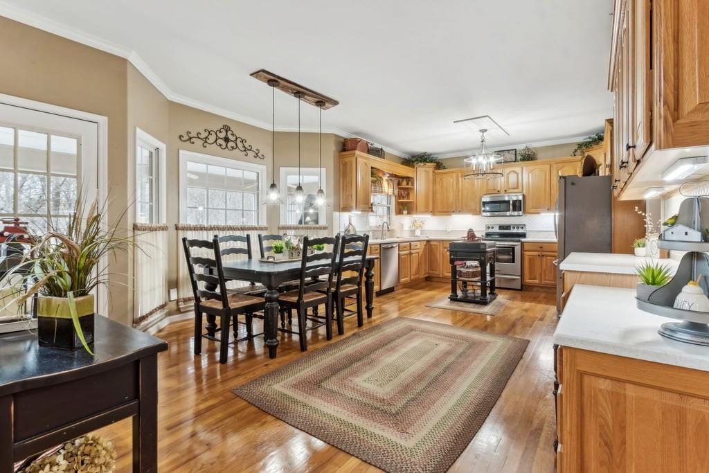 4385 Signal Ridge Court Buford, GA 30518 - Photo 16 of 81 a view of a dining room with furniture