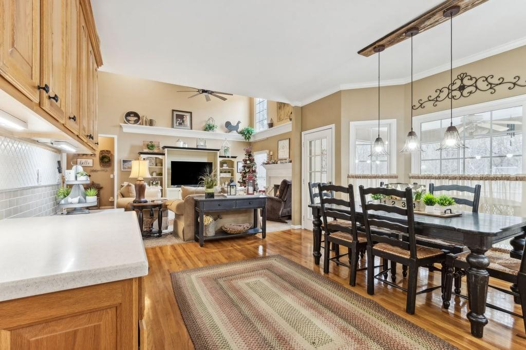4385 Signal Ridge Court Buford, GA 30518 - Photo 17 of 81 a living room with furniture a fireplace and a table