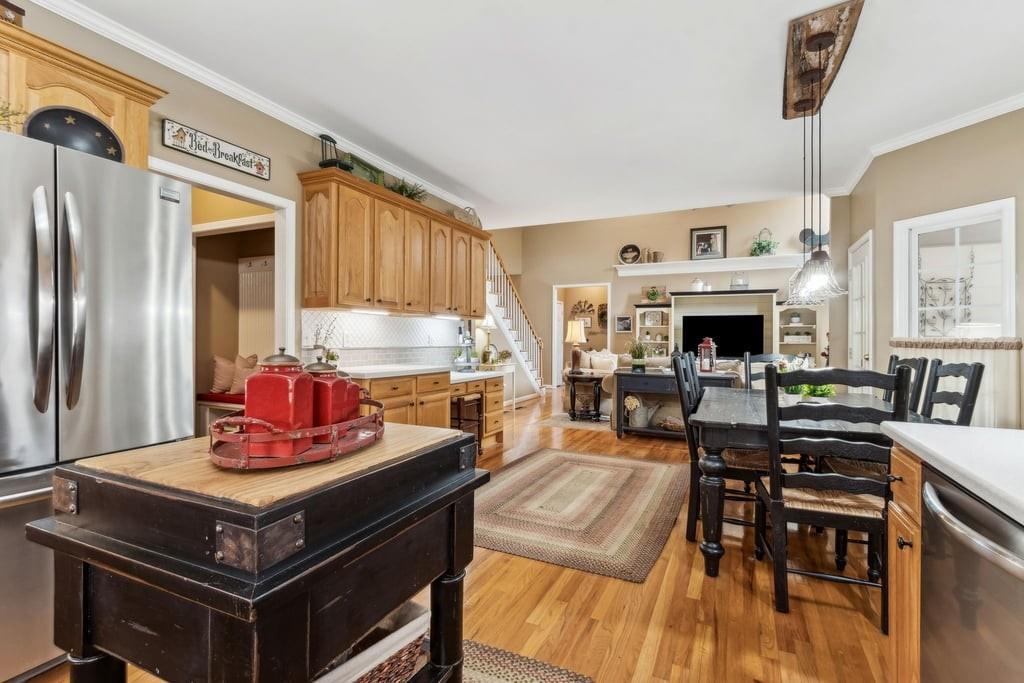 4385 Signal Ridge Court Buford, GA 30518 - Photo 22 of 81 a living room with furniture and a fireplace