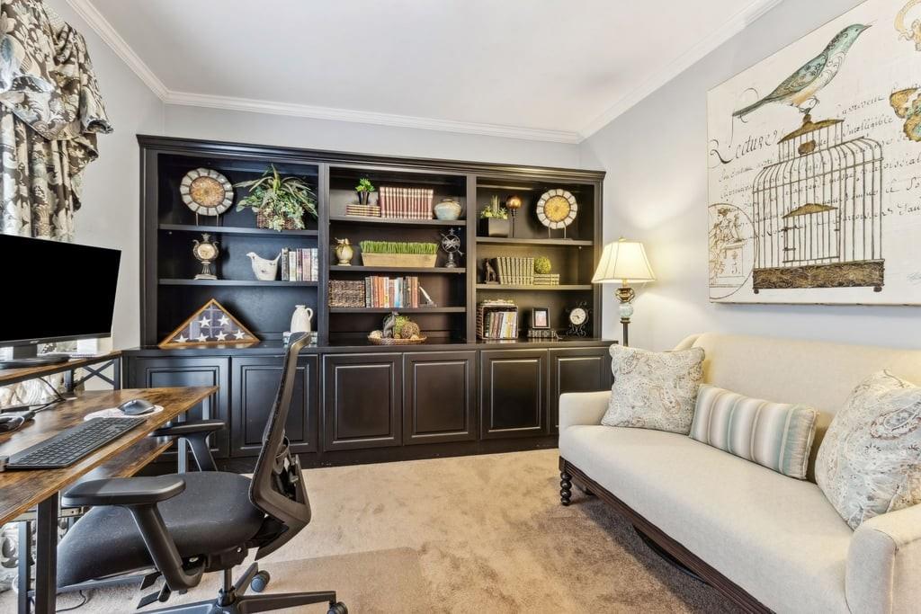 4385 Signal Ridge Court Buford, GA 30518 - Photo 26 of 81 a view of a livingroom with workspace and a couch