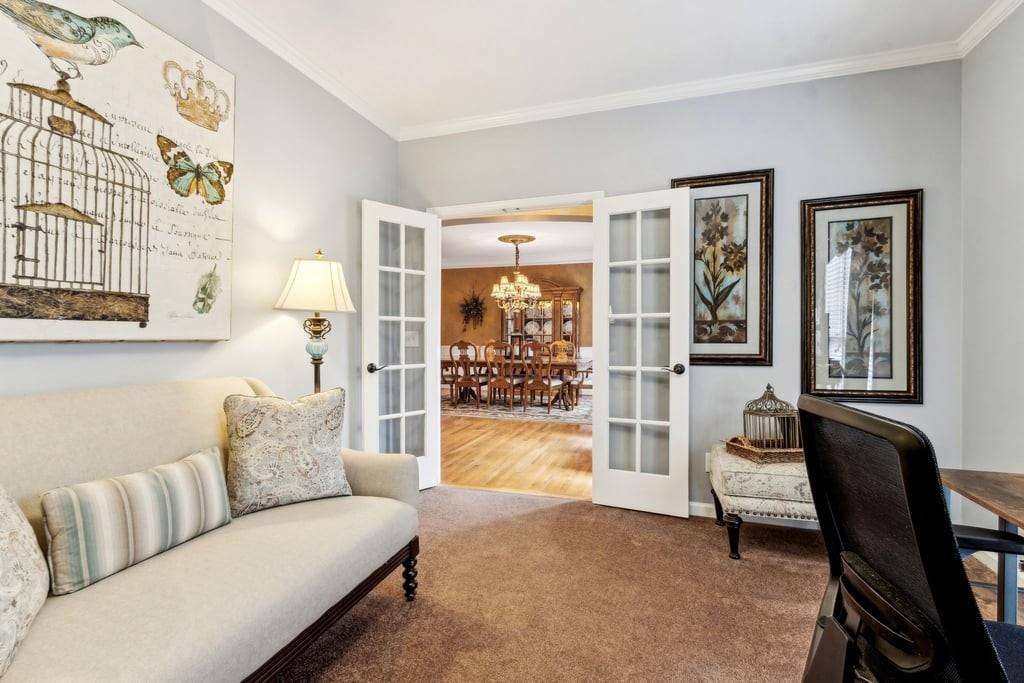 4385 Signal Ridge Court Buford, GA 30518 - Photo 27 of 81 a living room with furniture and a large window