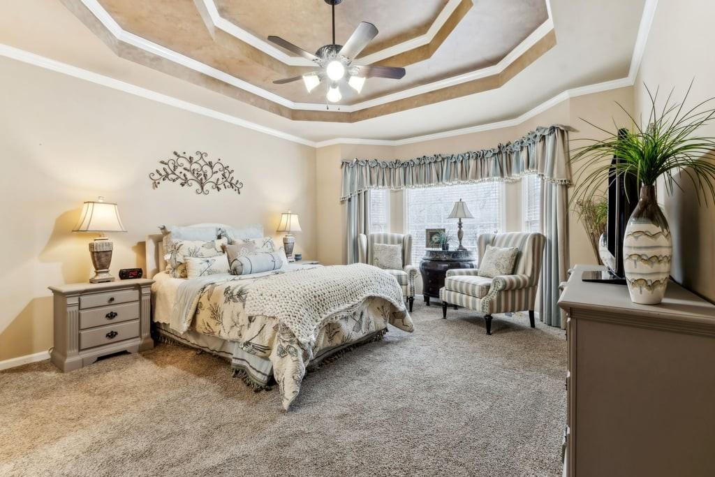 4385 Signal Ridge Court Buford, GA 30518 - Photo 29 of 81 a bed room with a bed and a chair