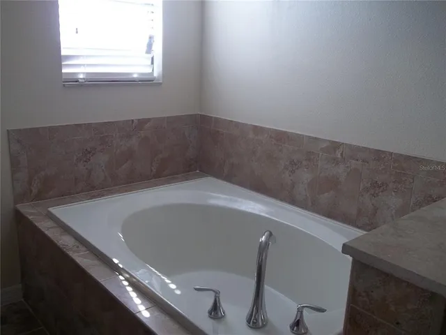a bathroom with a bathtub