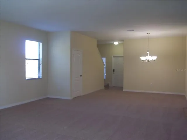 an empty room with a bathroom