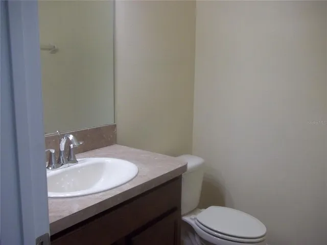 a bathroom with a sink and a toilet
