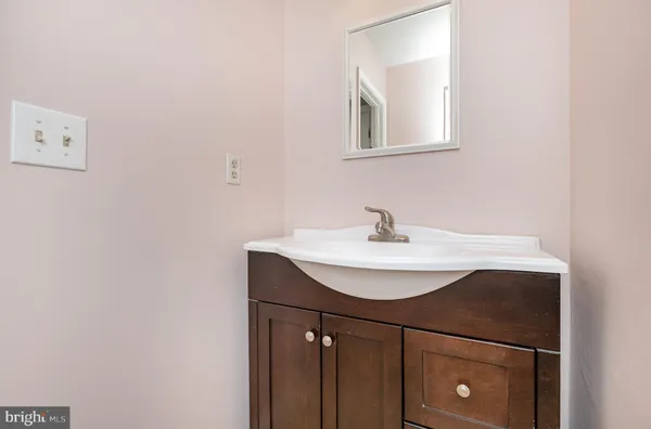 a sink with a mirror
