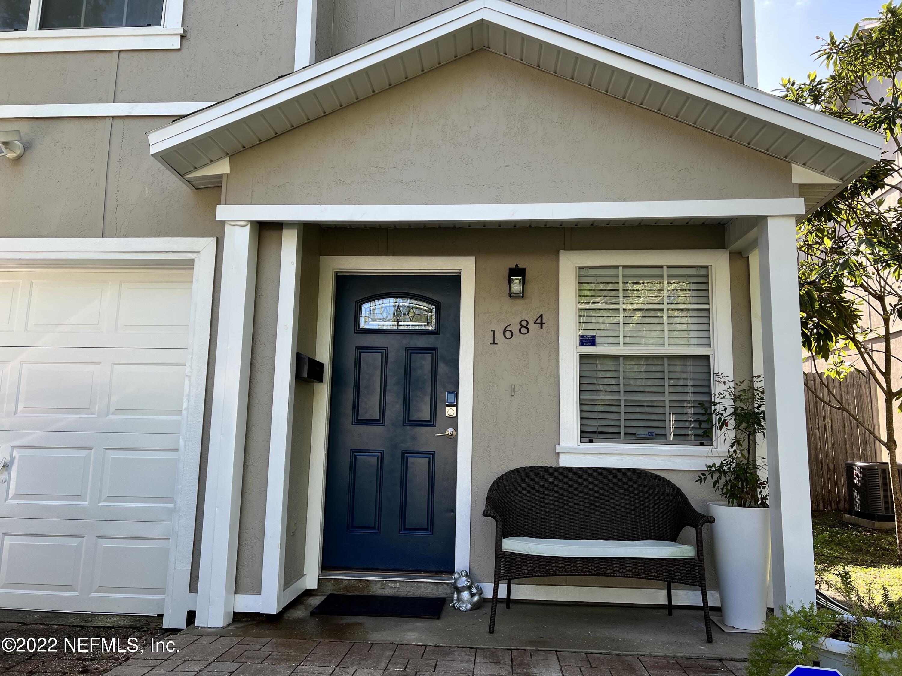 1684 Mayfair Road Jacksonville, FL 32207 - Photo 2 of 34 a front view of a house with a garden