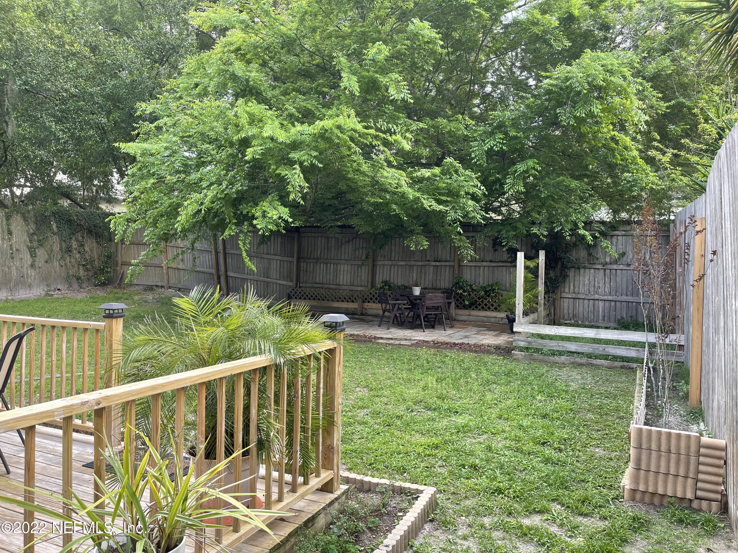 1684 Mayfair Road Jacksonville, FL 32207 - Photo 29 of 34 a view of a chair and table in backyard of the house