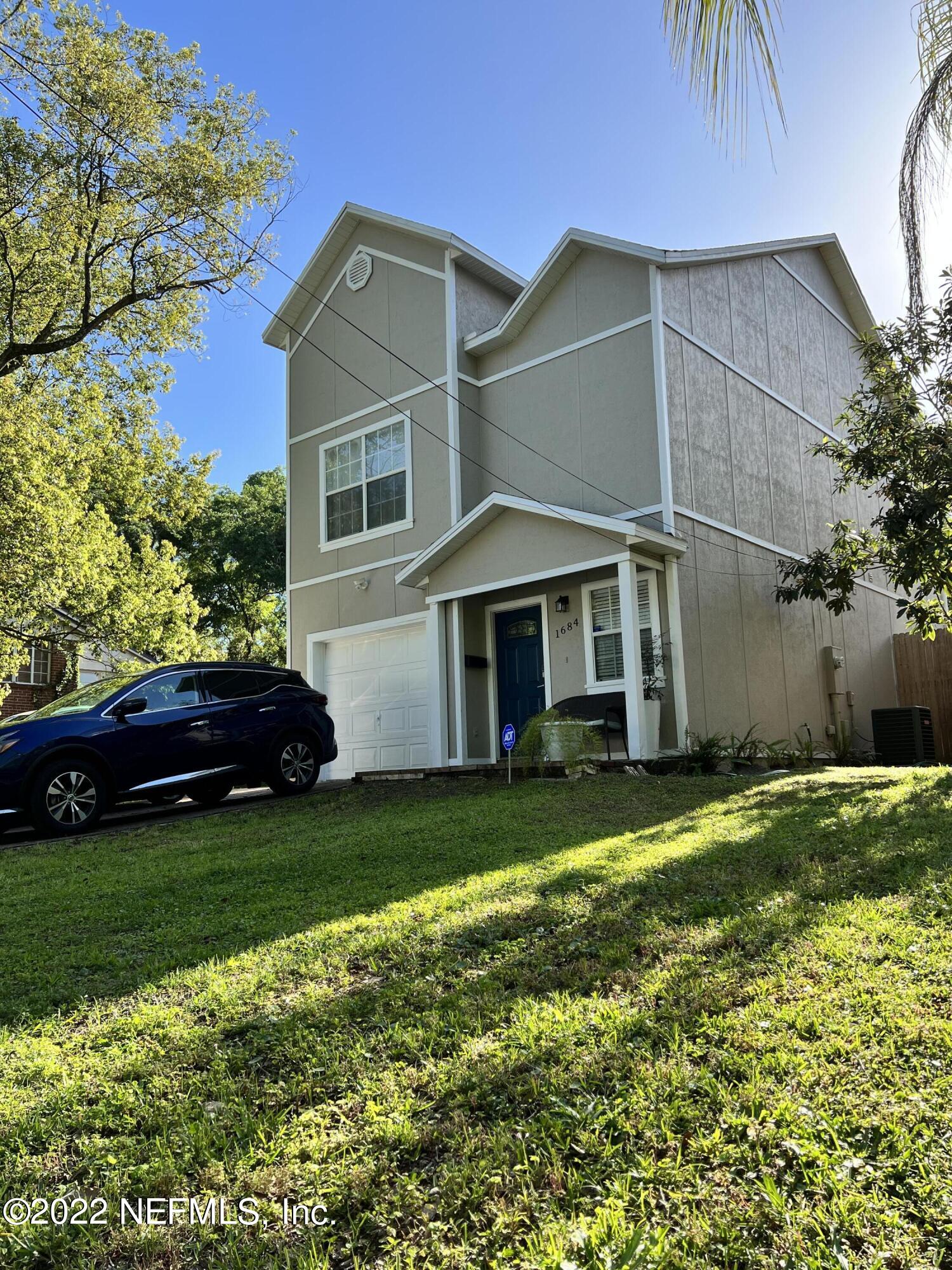 1684 Mayfair Road Jacksonville, FL 32207 - Photo 33 of 34 a front view of a house with a garden