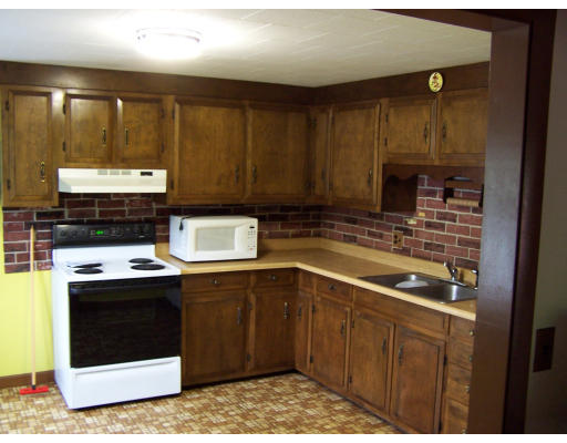 188 North Orange Road Athol, MA 01331 - Photo 5 of 6 a kitchen with stainless steel appliances granite countertop a stove a sink and a microwave
