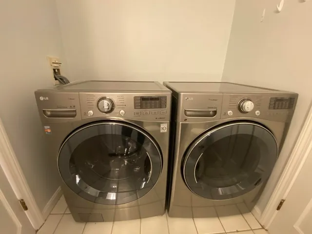 a utility room with dryer and washer