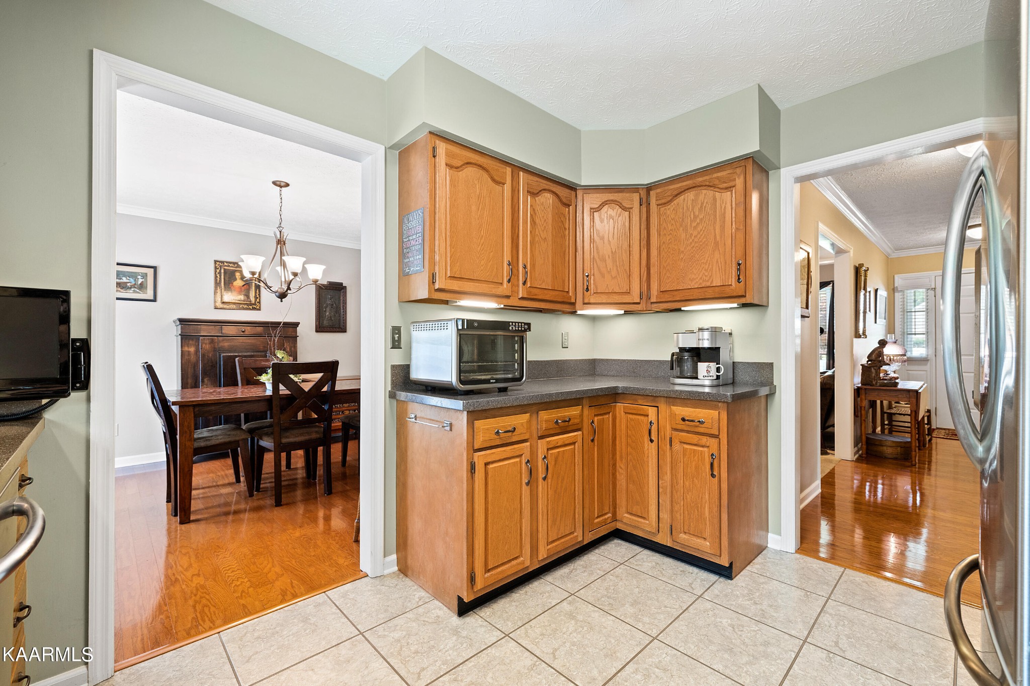 114 Capital Circle Oak Ridge, TN 37830 - Photo 17 of 50 a kitchen with stainless steel appliances granite countertop a refrigerator and a stove top oven