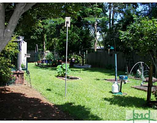 12708 Sunnybrook Road Savannah, GA 31419 - Photo 21 of 25 Yard/Garden. Beautifully Landscaped Backyard!